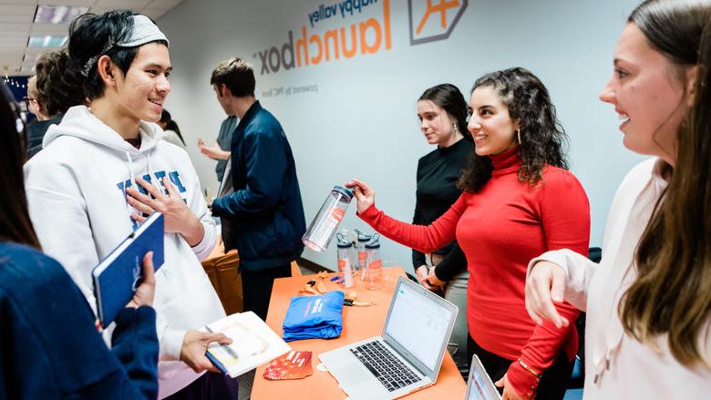 Students volunteers assist other students and community members at a GEW event at Happy Valley LaunchBox powered by PNC Bank